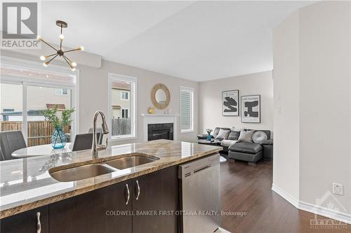 321 Meadowbreeze Drive, Ottawa, ON - Indoor Photo Showing Kitchen With Fireplace With Double Sink