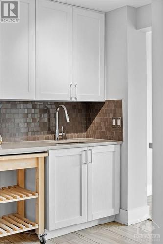 Soft-close cabinetry w/ lazy Susan corner cabinet & space for dishwasher. - 1505 Baseline Road Unit#511, Ottawa, ON - Indoor Photo Showing Kitchen