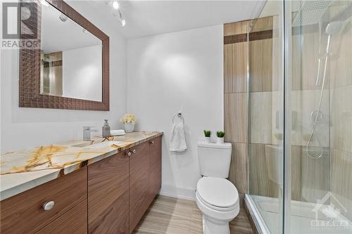 3 piece bathroom w/ glass enclosed rain shower & tons of storage! - 1505 Baseline Road Unit#511, Ottawa, ON - Indoor Photo Showing Bathroom