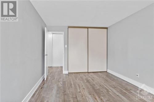 Large double closet & laminate flooring! - 1505 Baseline Road Unit#511, Ottawa, ON - Indoor Photo Showing Other Room