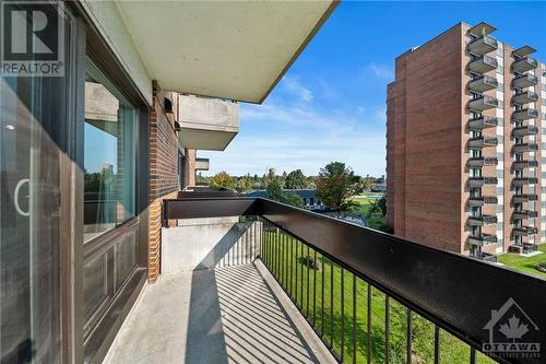 View to the left & great view into downtown and the outdoor pool. - 1505 Baseline Road Unit#511, Ottawa, ON - Outdoor With Balcony With Exterior