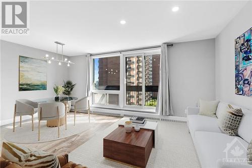 Tons of space to host dinner and relax in the living room. (Virtually staged) - 1505 Baseline Road Unit#511, Ottawa, ON - Indoor Photo Showing Living Room