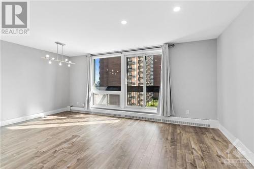 Walkout to expansive covered balcony facing East! - 1505 Baseline Road Unit#511, Ottawa, ON - Indoor Photo Showing Other Room