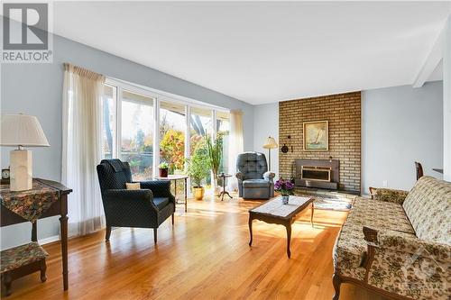 43 Harwick Crescent, Ottawa, ON - Indoor Photo Showing Living Room With Fireplace