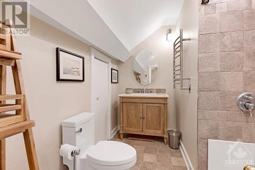 Second floor 4-pc bathroom with heated towel warmers and  radiant heated floor - 5B Lewis Street, Perth, ON - Indoor Photo Showing Bathroom