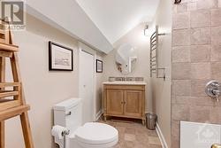 Second floor 4-pc bathroom with heated towel warmers and  radiant heated floor - 