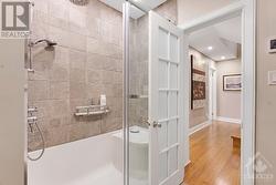 Second floor bathroom tub area and shower enclosure - 