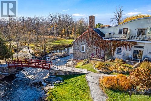 Walk out your door to foot bridge across Tay River to historical Stewart Park - 5B Lewis Street, Perth, ON - Outdoor