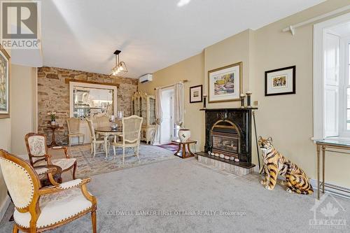 5B Lewis Street, Perth, ON - Indoor Photo Showing Living Room With Fireplace