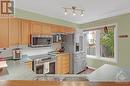 The kitchen, complete with ample cabinetry and sleek, premium stainless steel appliances - 17 Coleridge Street, Ottawa, ON  - Indoor Photo Showing Kitchen 