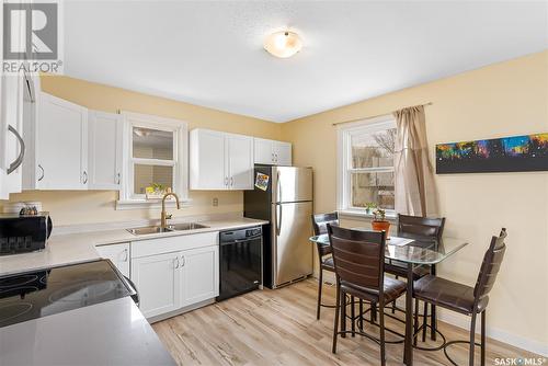 908 L Avenue S, Saskatoon, SK - Indoor Photo Showing Kitchen With Double Sink