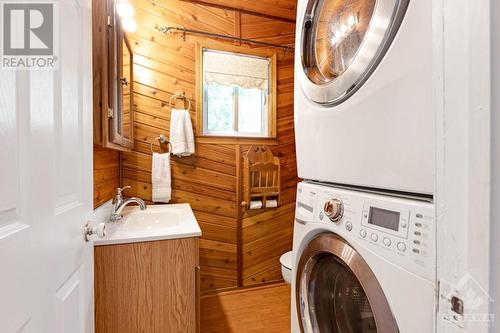 Combined powder room and laundry station - 193 Pretties Island Road, Carleton Place, ON - Indoor Photo Showing Laundry Room