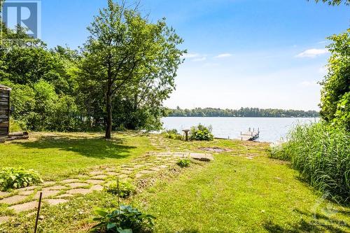 Pathway leads to waterfront - 193 Pretties Island Road, Carleton Place, ON - Outdoor With Body Of Water With View