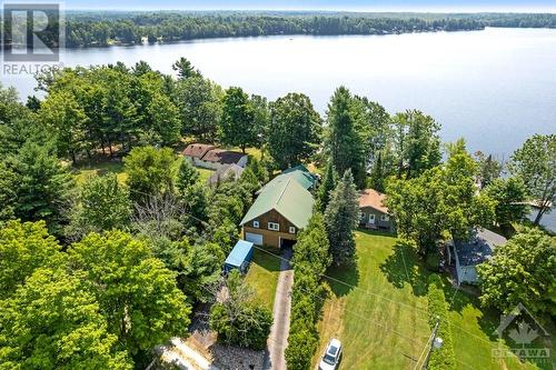 Both home and garage have 2010 metal roofs - 193 Pretties Island Road, Carleton Place, ON - Outdoor With Body Of Water With View