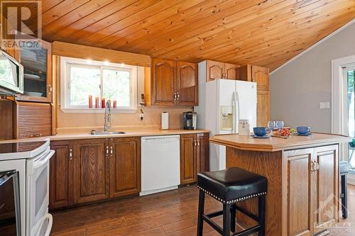 Welcoming kitchen has corner display cupboard and appliance garage - 193 Pretties Island Road, Carleton Place, ON - Indoor Photo Showing Kitchen