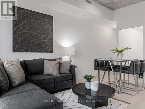 701 - 195 Mccaul Street, Toronto, ON - Indoor Photo Showing Living Room