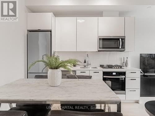 701 - 195 Mccaul Street, Toronto, ON - Indoor Photo Showing Kitchen With Double Sink With Upgraded Kitchen