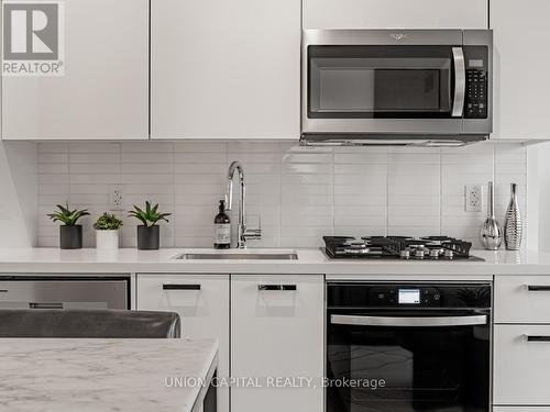 701 - 195 Mccaul Street, Toronto, ON - Indoor Photo Showing Kitchen With Upgraded Kitchen