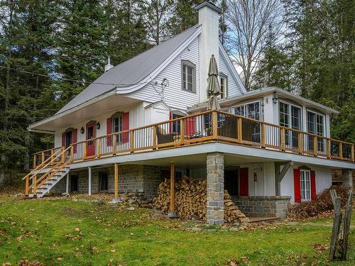 Vue d'ensemble - 138 Ch. Boyer, Saint-Sauveur, QC - Outdoor With Deck Patio Veranda With Facade