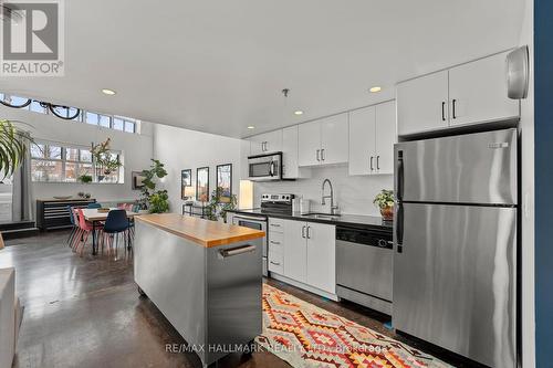 140 - 1173 Dundas Street E, Toronto, ON - Indoor Photo Showing Kitchen With Stainless Steel Kitchen With Upgraded Kitchen