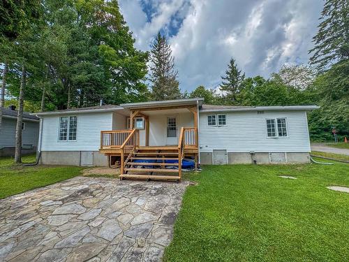 Back facade - 35 Tsse Legault, Grenville-Sur-La-Rouge, QC - Outdoor With Deck Patio Veranda