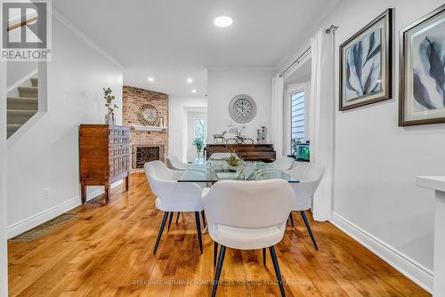 304 Withrow Avenue, Toronto, ON - Indoor Photo Showing Dining Room With Fireplace