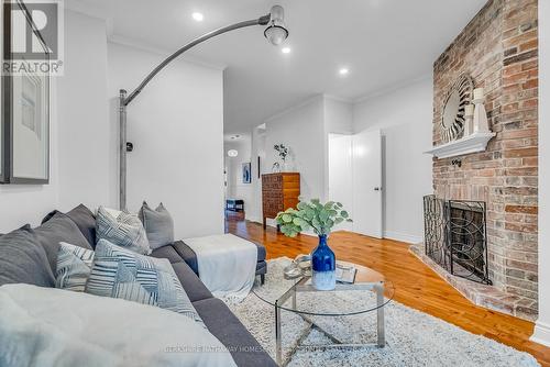 304 Withrow Avenue, Toronto, ON - Indoor Photo Showing Living Room With Fireplace