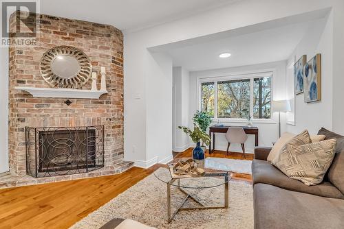 304 Withrow Avenue, Toronto, ON - Indoor Photo Showing Living Room With Fireplace