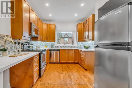 304 Withrow Avenue, Toronto, ON - Indoor Photo Showing Kitchen With Stainless Steel Kitchen With Double Sink