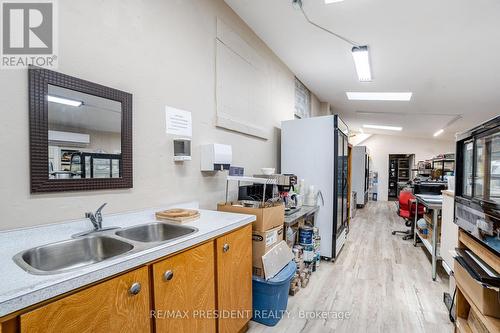 5685 Robinson Street, Niagara Falls, ON - Indoor Photo Showing Kitchen With Double Sink