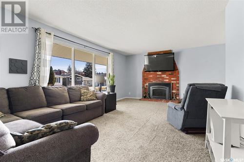 24 Arlington Street, Regina, SK - Indoor Photo Showing Living Room With Fireplace