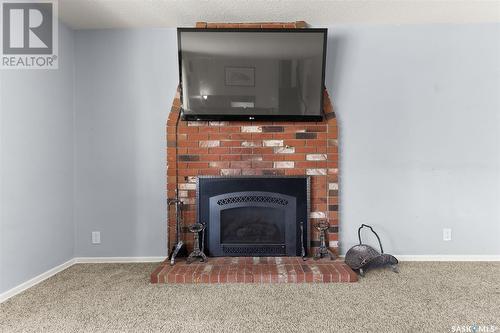 24 Arlington Street, Regina, SK - Indoor Photo Showing Living Room With Fireplace