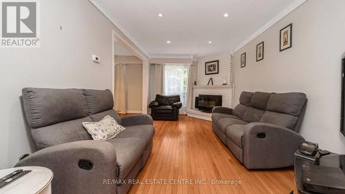 14 Simmons Boulevard, Brampton, ON - Indoor Photo Showing Living Room With Fireplace