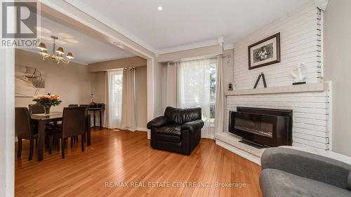 14 Simmons Boulevard, Brampton, ON - Indoor Photo Showing Living Room With Fireplace