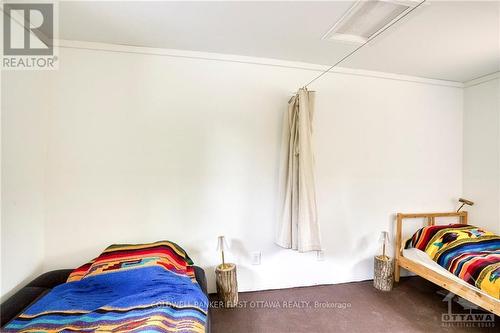 2062 Cross Road, Central Frontenac (Frontenac Centre), ON - Indoor Photo Showing Bedroom