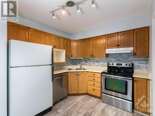 5 Henry Goulburn Way Unit#I, Stittsville, ON - Indoor Photo Showing Kitchen With Double Sink