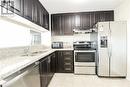 912 - 3050 Ellesmere Road, Toronto, ON  - Indoor Photo Showing Kitchen With Double Sink 