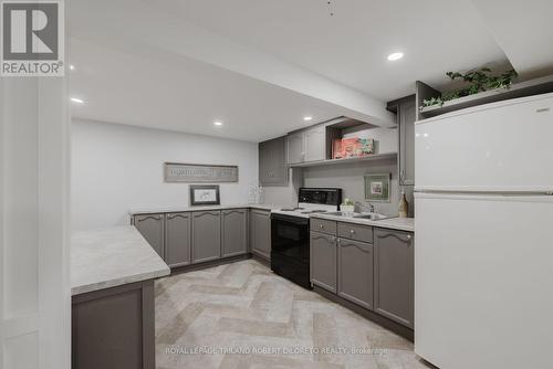 11 Elmhurst Street, Middlesex Centre (Kilworth), ON - Indoor Photo Showing Kitchen With Double Sink