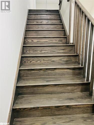 Stairs with hardwood / wood-style flooring - 113 Stern Drive, Welland, ON - Indoor Photo Showing Other Room