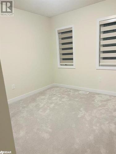 View of carpeted empty room - 113 Stern Drive, Welland, ON - Indoor Photo Showing Other Room