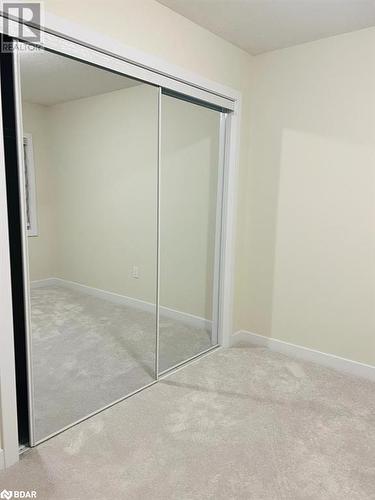 Unfurnished bedroom with a closet and light colored carpet - 113 Stern Drive, Welland, ON - Indoor Photo Showing Other Room