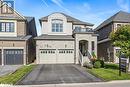 French country style house with a balcony, a front yard, and a garage - 19 Mugford Crescent, Brampton, ON  - Outdoor With Facade 