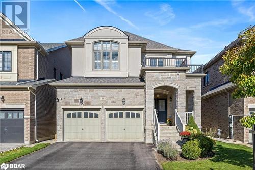 View of front of house with a balcony and a garage - 19 Mugford Crescent, Brampton, ON - Outdoor With Facade