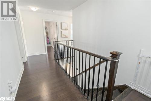 Hallway featuring dark wood-type flooring - 19 Mugford Crescent, Brampton, ON - Indoor Photo Showing Other Room