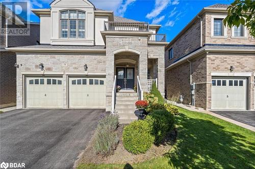 View of front of house with a garage - 19 Mugford Crescent, Brampton, ON - Outdoor With Facade