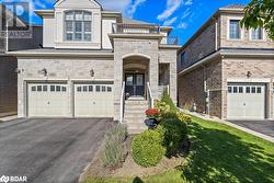 View of front of house with a garage - 