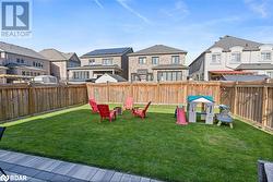 View of yard featuring a playground - 