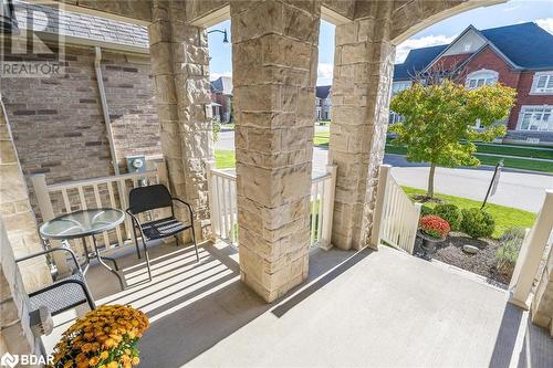 View of patio with covered porch - 19 Mugford Crescent, Brampton, ON - 