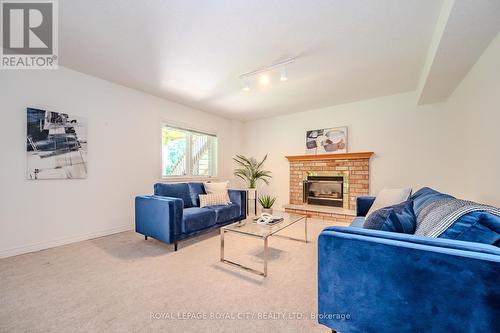 7 Whitetail Court, Guelph, ON - Indoor Photo Showing Living Room With Fireplace