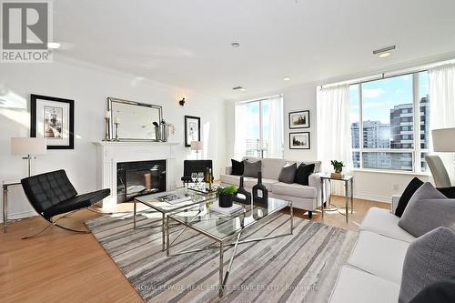 Ph 3 - 850 Steeles Avenue W, Vaughan, ON - Indoor Photo Showing Living Room With Fireplace